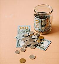 Jar with US Dollars and Coinage